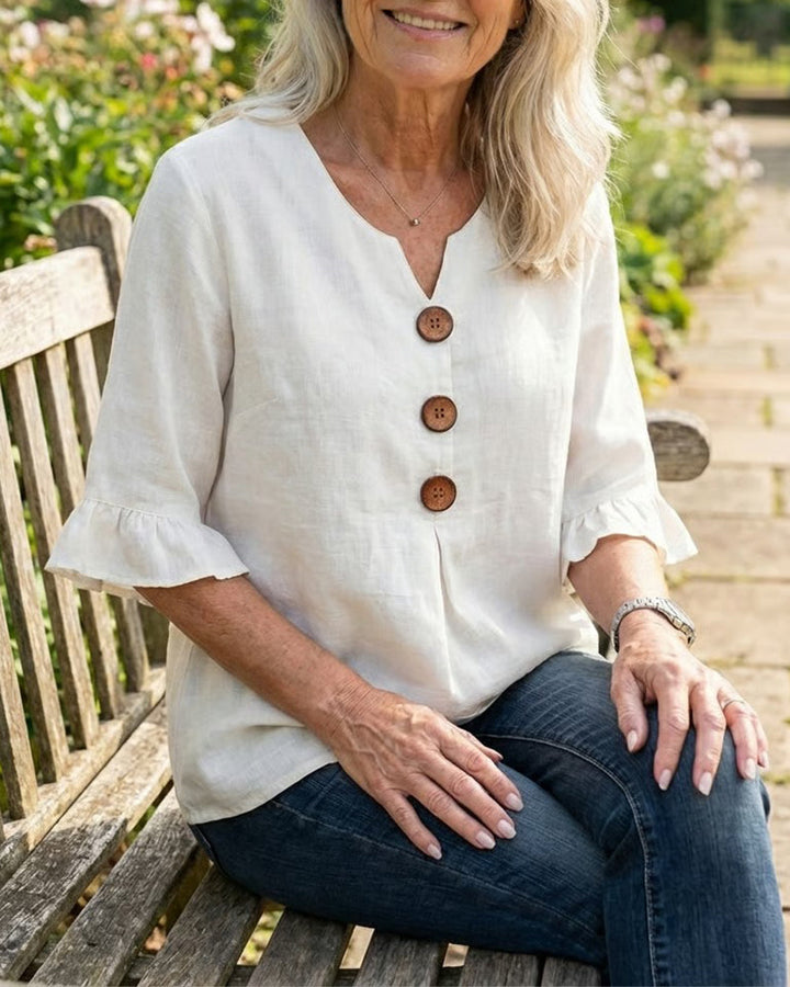 MADISON | V-NECK BLOUSE WITH WOODEN BUTTONS AND RUFFLE SLEEVES
