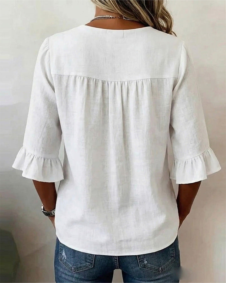 MADISON | V-NECK BLOUSE WITH WOODEN BUTTONS AND RUFFLE SLEEVES
